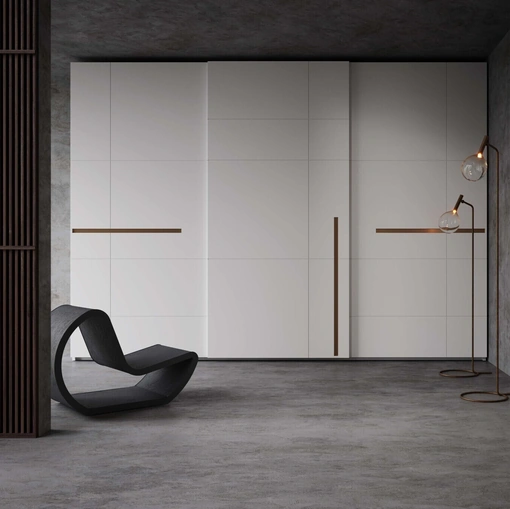 Armadio laccato bianco con inserti in bronzo Prestige 3 ante scorrevoli di Voltan