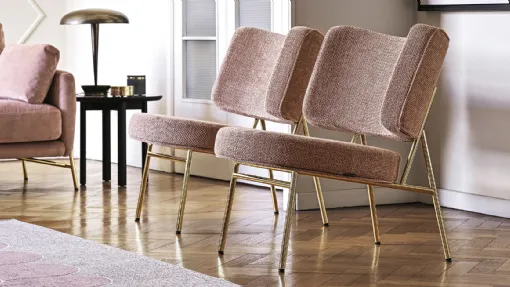 Poltroncina in tessuto con struttura in tubo di metallo Coco di Calligaris