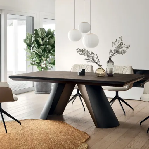 Sedia Cocoon in tessuto e pelle con base girevole di Calligaris