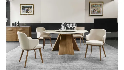 Tavolo rotondo con piano in ceramica e basamento in legno Icaro di Calligaris